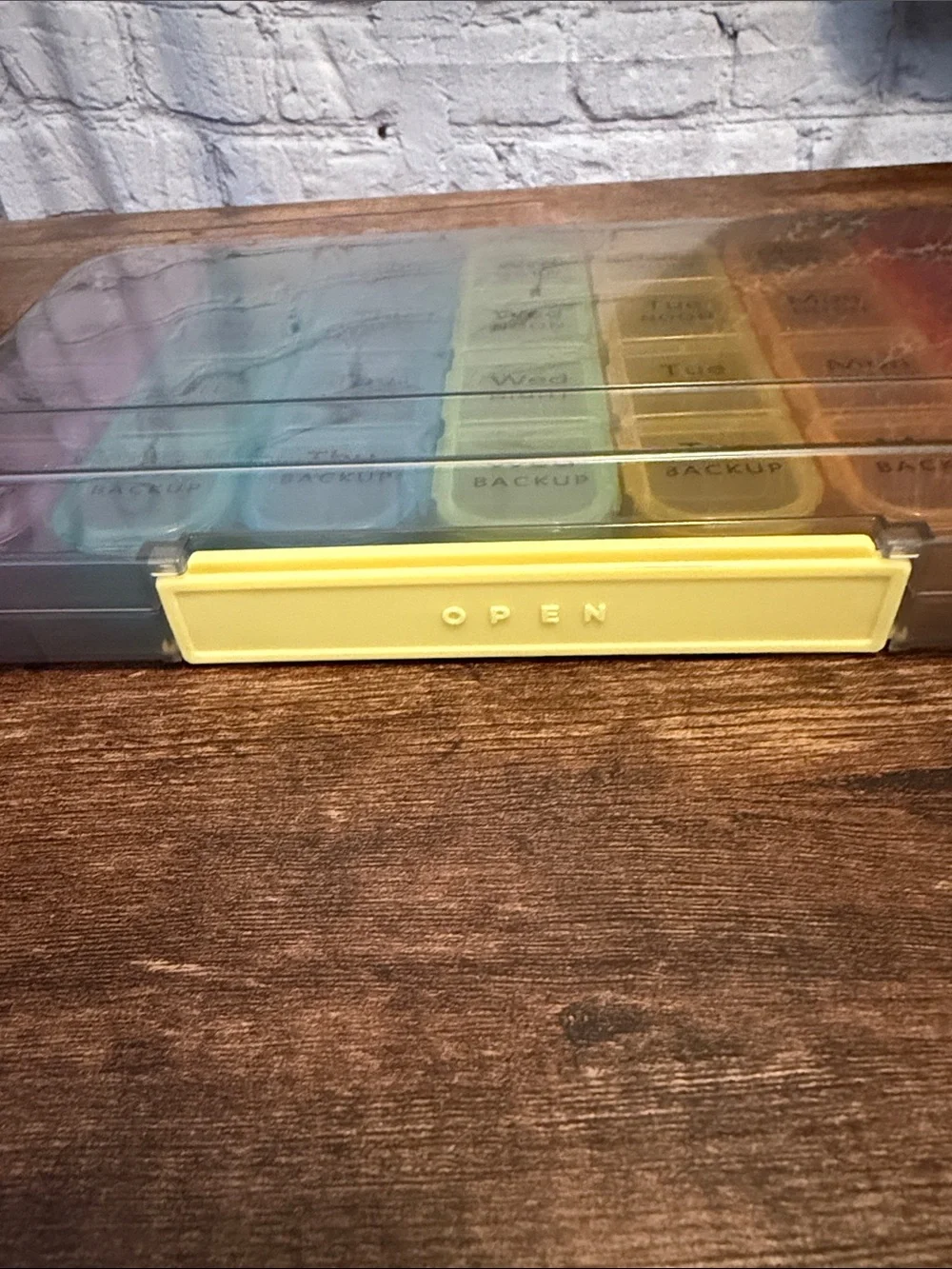 Rainbow Weekly Pill Organizer with Yellow Latch